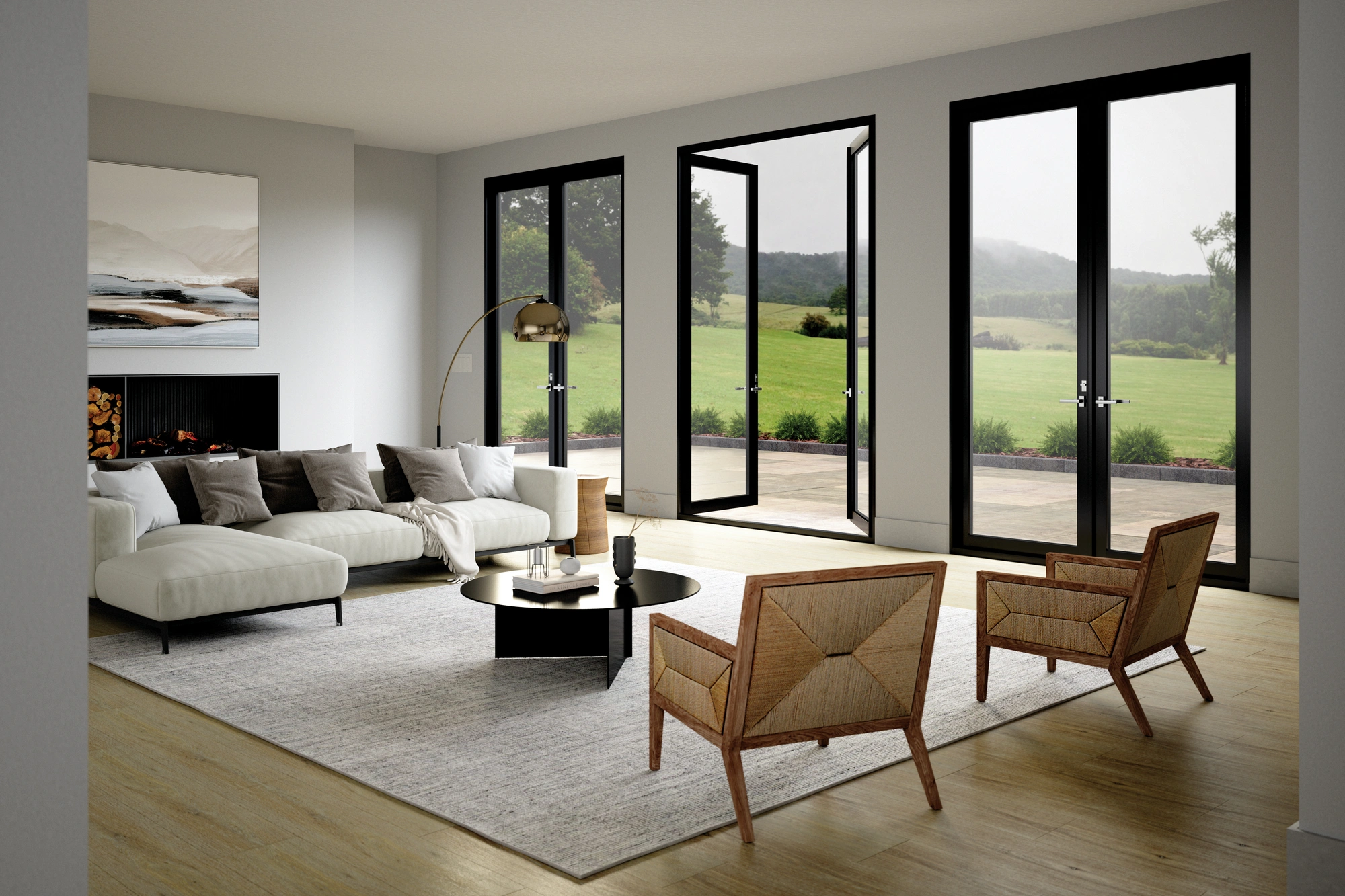 Living room with modern furniture and large black-framed patio doors opening to a scenic backyard, showcasing a standard sliding glass door width design