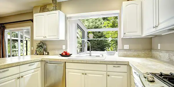 image of open kitchen with multiple windows illustrating vinyls windows benefits