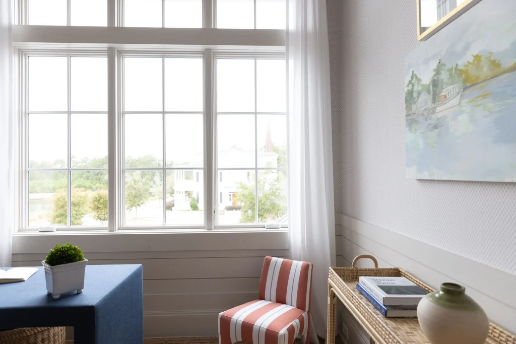 Image of Marvin Elevate double-hung set in bright coastal home office with shiplap walls