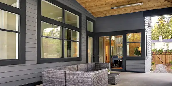image of modern home exterior with dark vinyl doors and windows, can you paint vinyl doors design idea
