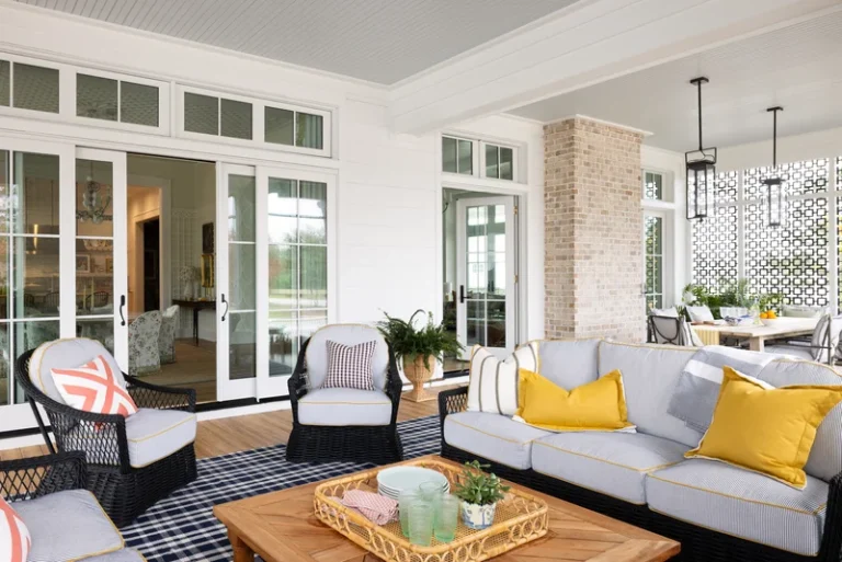 Image of patio door replacement Charlotte NC showing French doors opening to a furnished outdoor patio