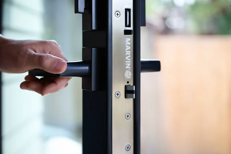 Image of a Marvin multi-point lock handle on a black front door